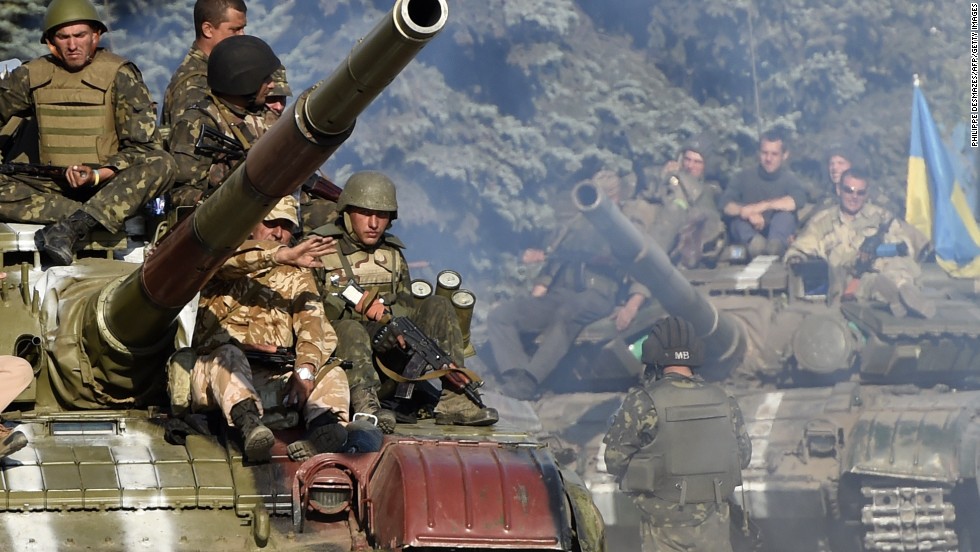 Ukraine, rebels sign ceasefire deal as EU leaders consider sanctions on Russia